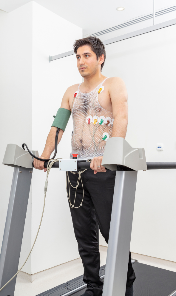 Patient walking on a treadmill during a stress test